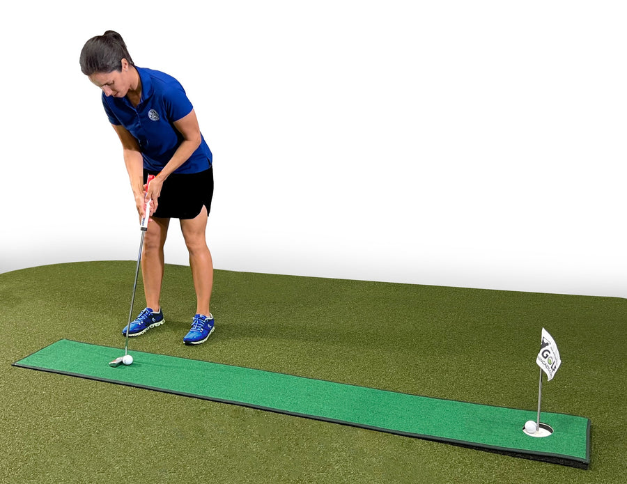 Golfer practicing with the Home Putt portable putting mat